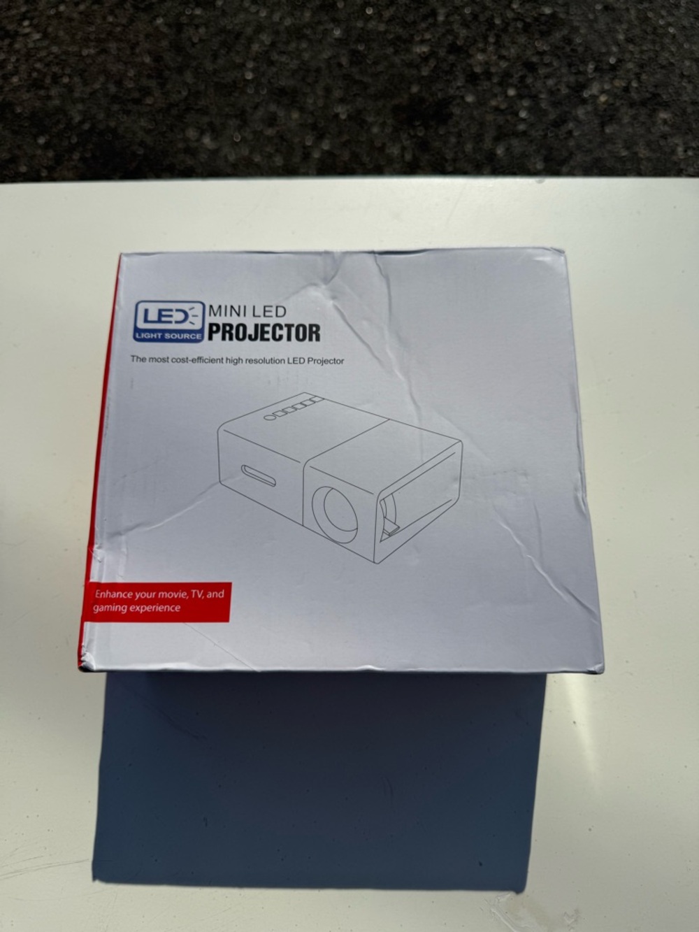 Amazon Mini LED Projector White with Red Accent